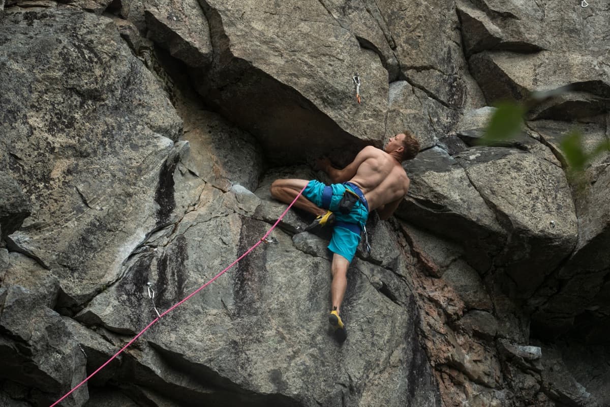Climber progressing through a structured training journey.